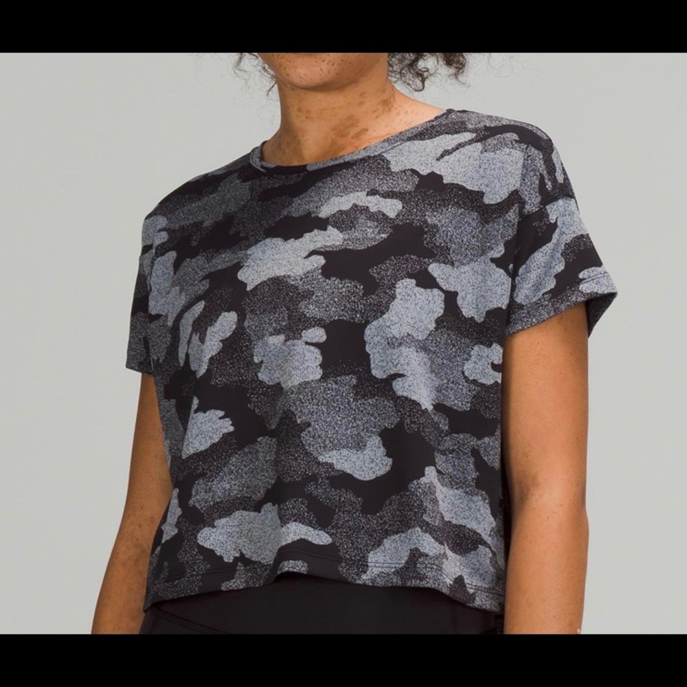 A grey camo Lululemon cates tee in a size 2.